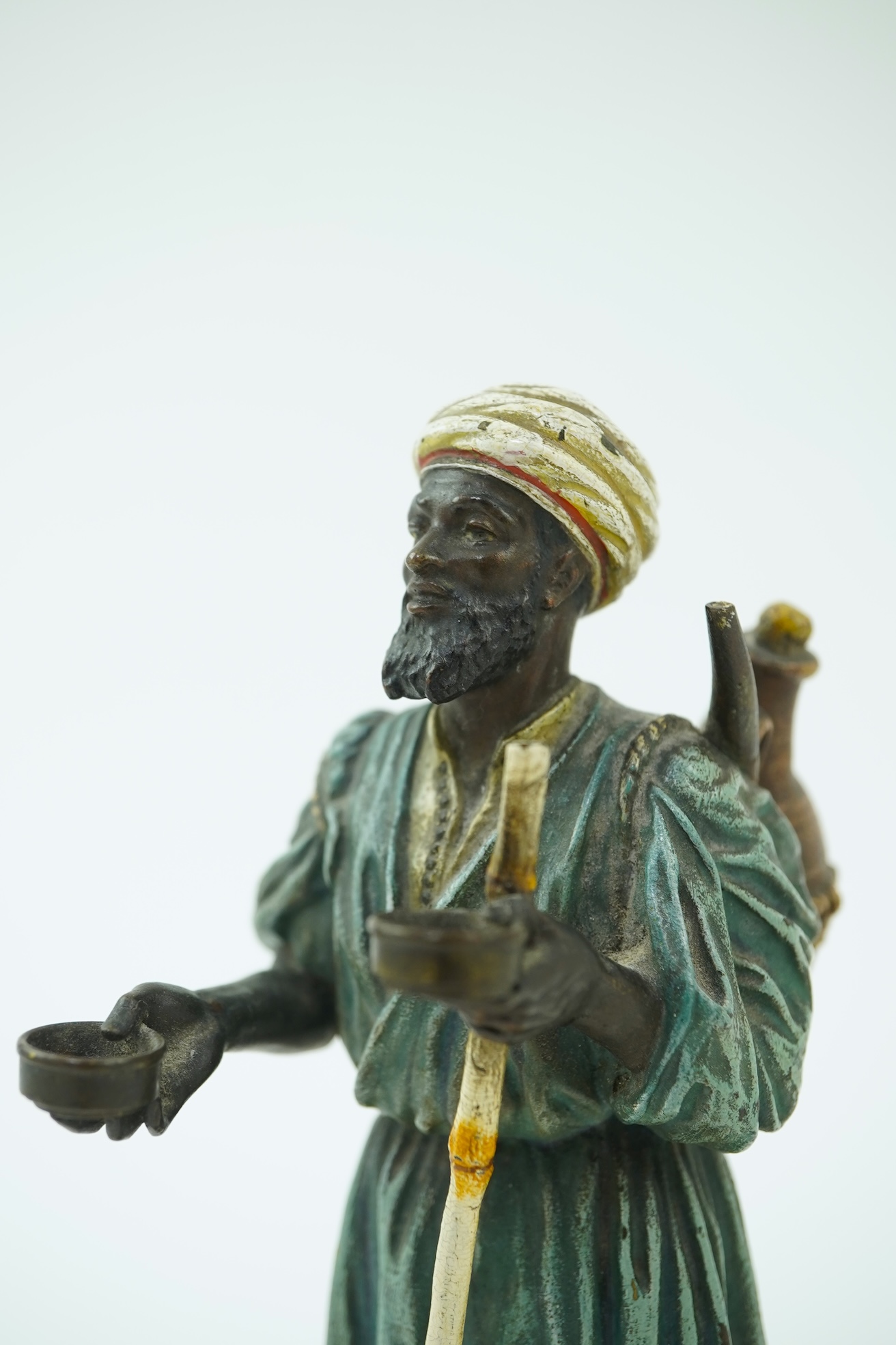 Franz Xavier Bergman (Austrian, 1861-1936). A Viennese cold painted bronze figure of a North African street vendor
